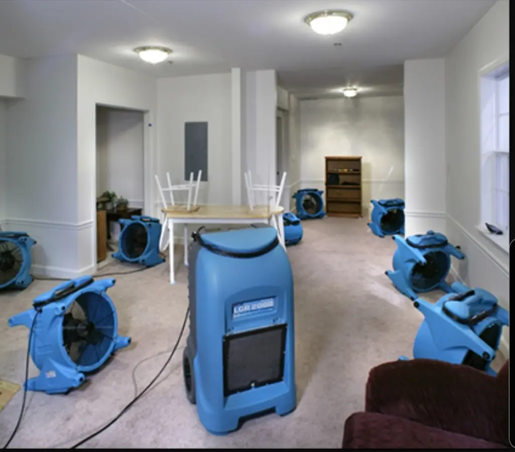 Air movers and dehumidifier setup for Water Damage Restoration in El Dorado